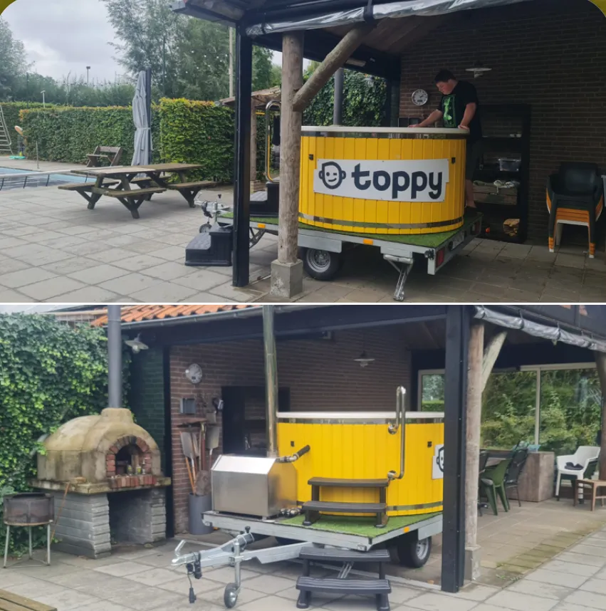 Tubby op de aanhanger onder een overkapping bij een zwembad