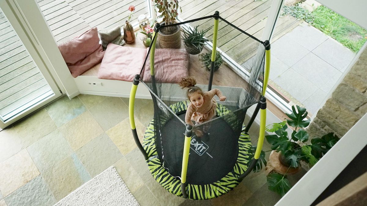 EXIT Tiggy Junior 140 cm zwart/groen trampoline + veiligheidsnet binnen
