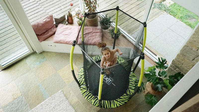 EXIT Tiggy Junior 140 cm zwart/groen trampoline + veiligheidsnet binnen