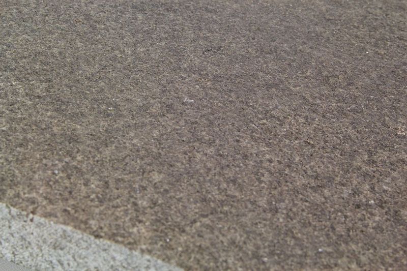 Kleur AQS Asian Black randtegel – hoekstuk