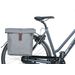 Basil City dubbele fietstas - 28/32 liter - Grijs op de fiets